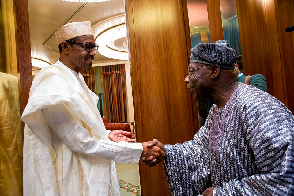 President Muhammadu Buhari receiving former President Olusegun Obasanjo at the State House in Abuja on Thursday, April 7, 2016.