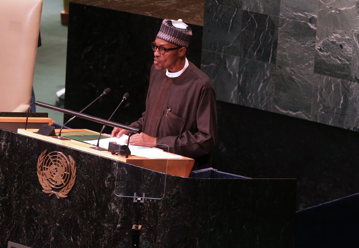 Buhari hails economic relations with France, Switzerland
