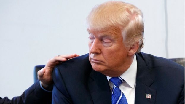 Trump apologizes as sex tape angers party members