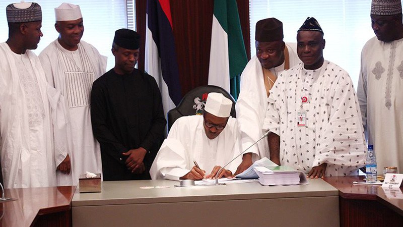 Buhari meets Saraki, signs 8 bills into law