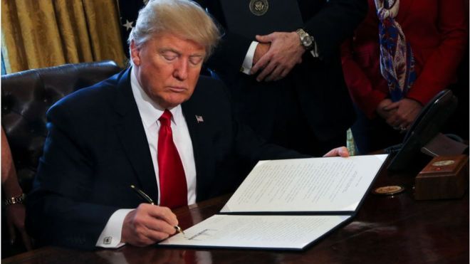 Thirty more tech firms oppose Trump ban