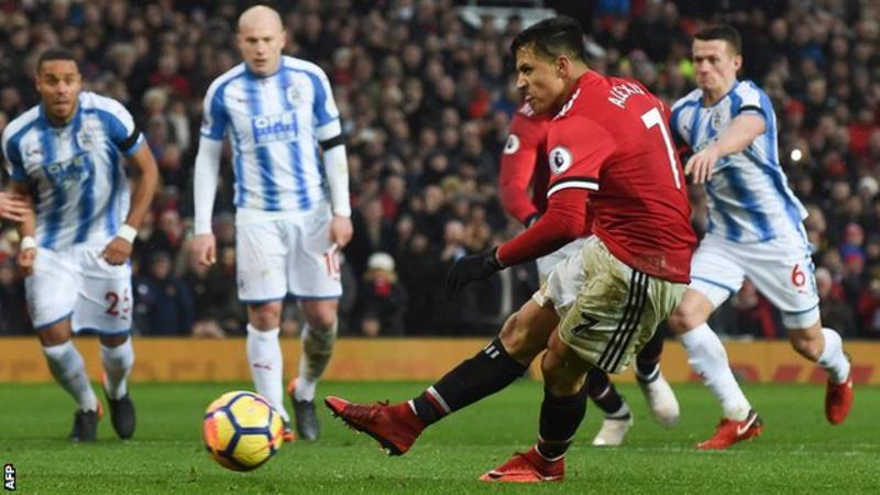 Sanchez scores first goal for United in Huddersfield win