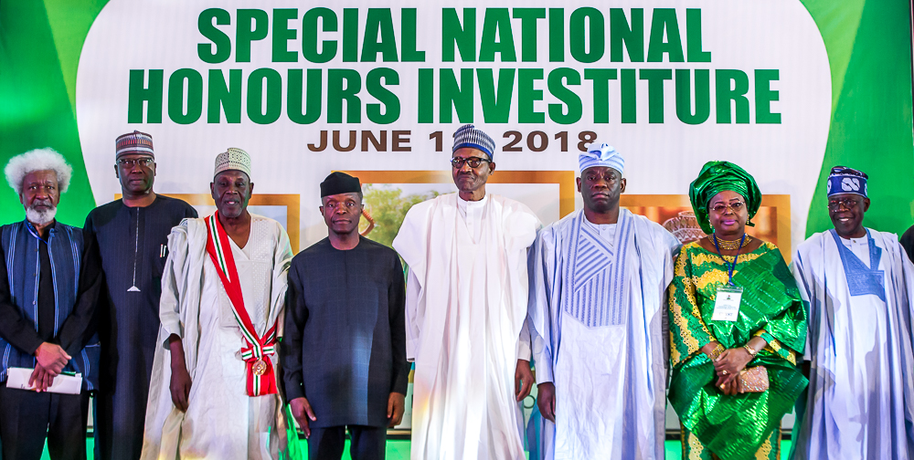 President Muhammadu Buhari declared June 12 Democracy Day and honoured late Chief M.K.O Abiola with national honours award of the Grand Commander of the Order of the Federal Republic (GCFR). His running mate, Ambassador Babagana Kingibe, and late human rights activist and lawyer, Chief Abdul Ganiyu Fawehinmi, with Grand Commander of the Order of the Niger (GCON), at the Presidential Villa, Abuja. PHOTO: State House