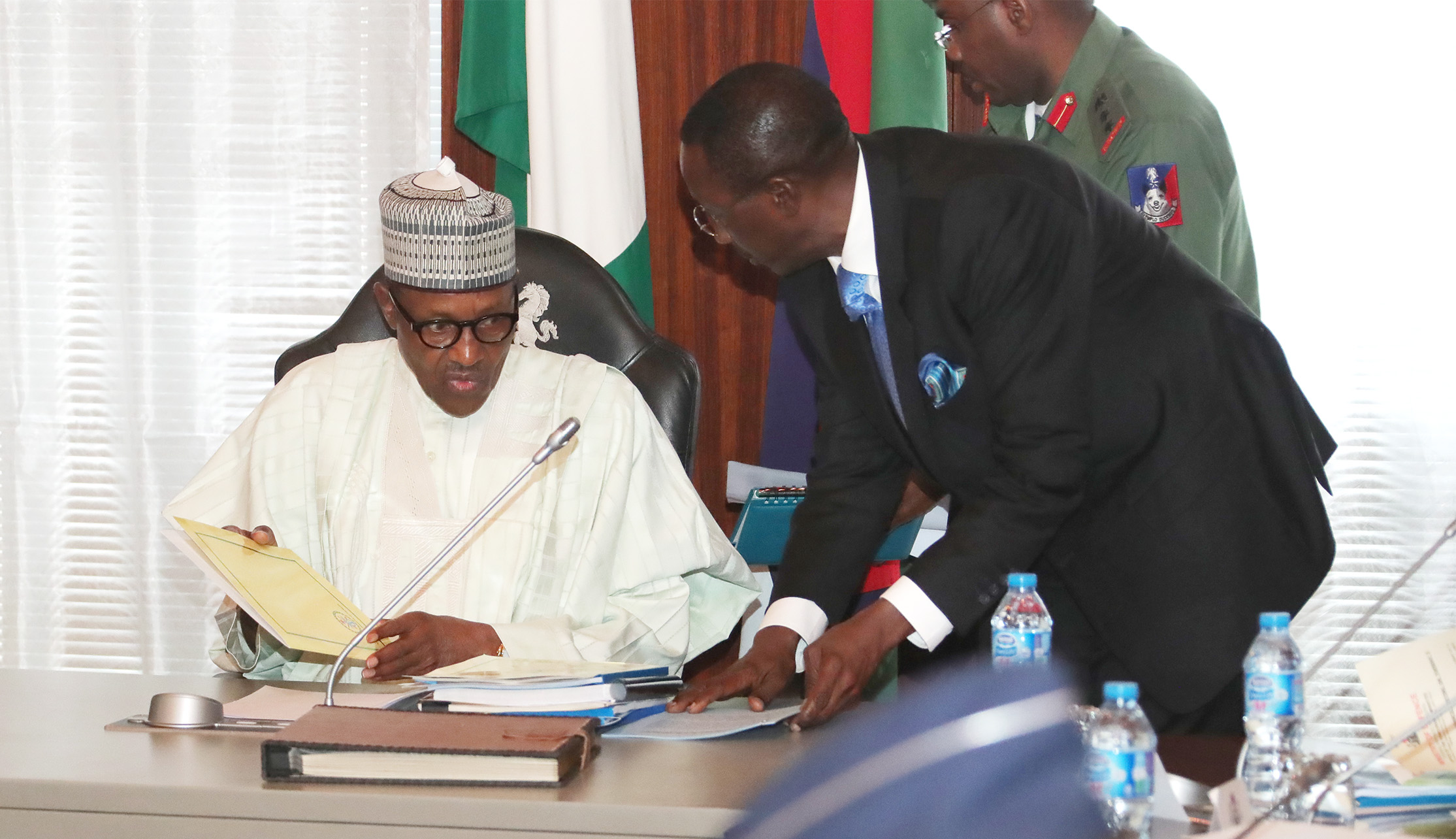 President Muhammadu Buhari meets service chiefs and heads of security agencies at the State House in Abuja.