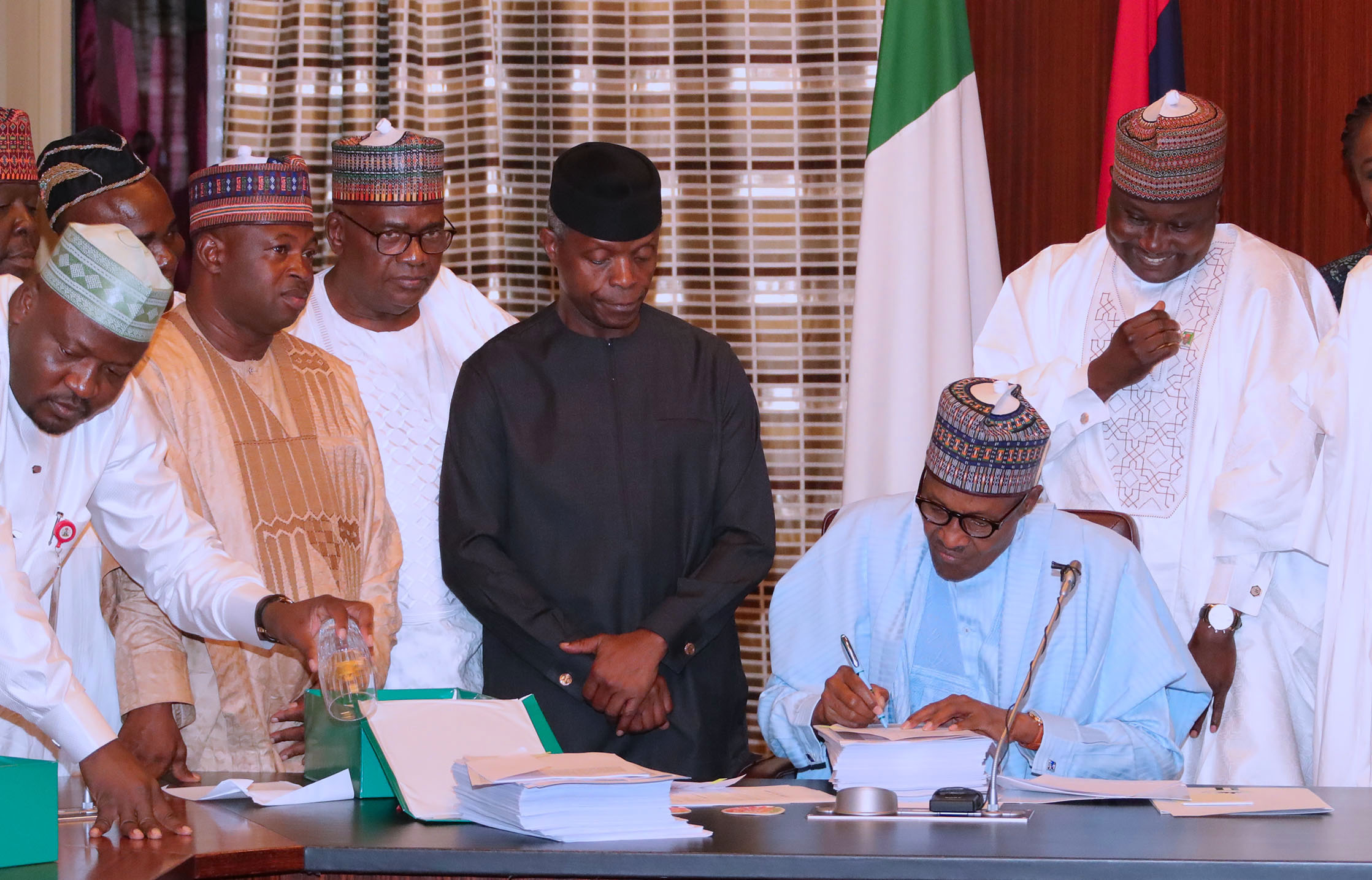 Buhari signs 2018 budget, says NASS cut everything
