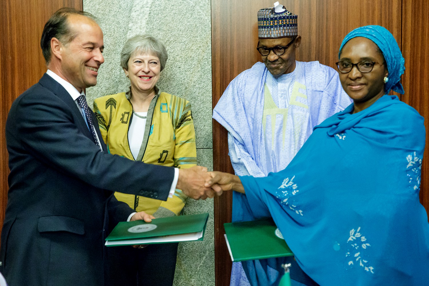 Tackle Buhari on dictatorial tendencies, 4trn missing funds, PDP tells Theresa May
