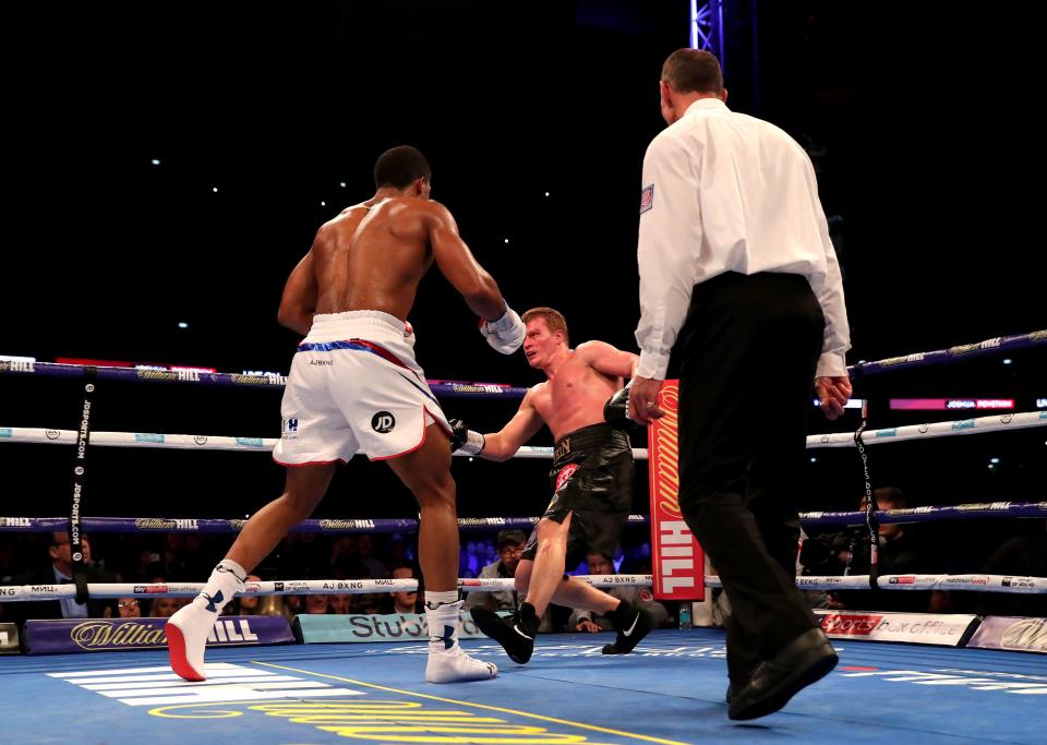 Joshua knocks out Povetkin to retain world titles