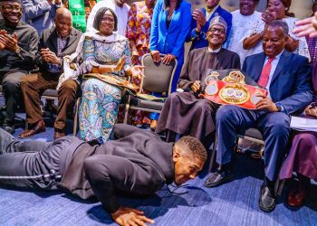 PHOTOS: Anthony Joshua presents belts to Buhari, prostrates