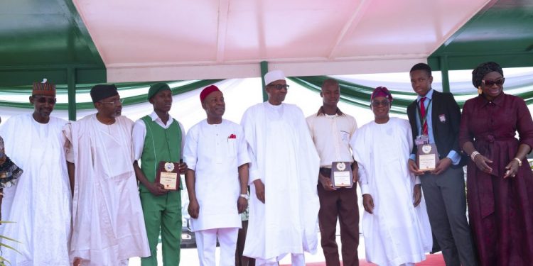 Buhari awards scholarship to 3 science students, says future belongs to Nigerian youth