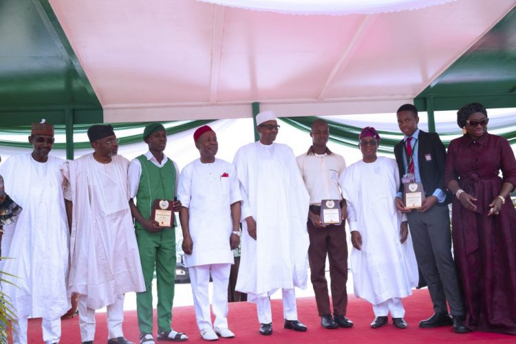 Buhari awards scholarship to 3 science students, says future belongs to Nigerian youth