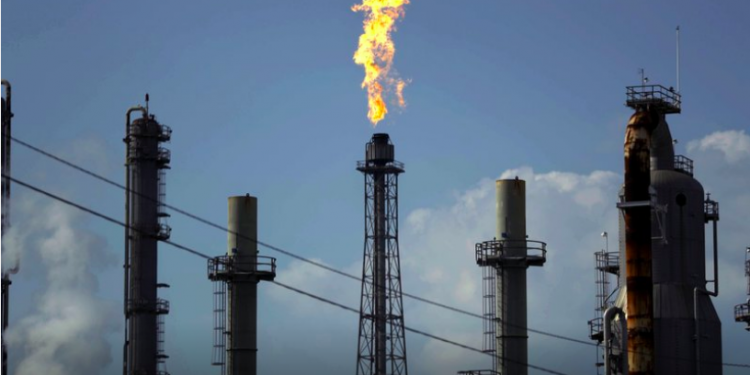 Oil plunges 20% as another virus-fueled trading week begins
