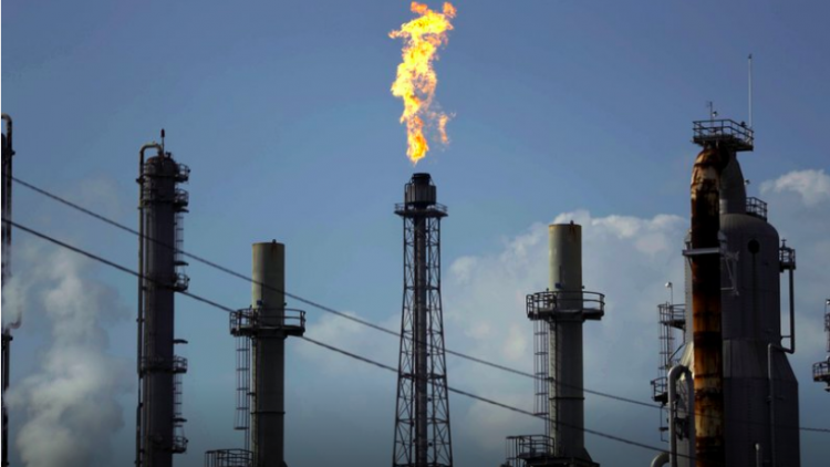 Oil plunges 20% as another virus-fueled trading week begins