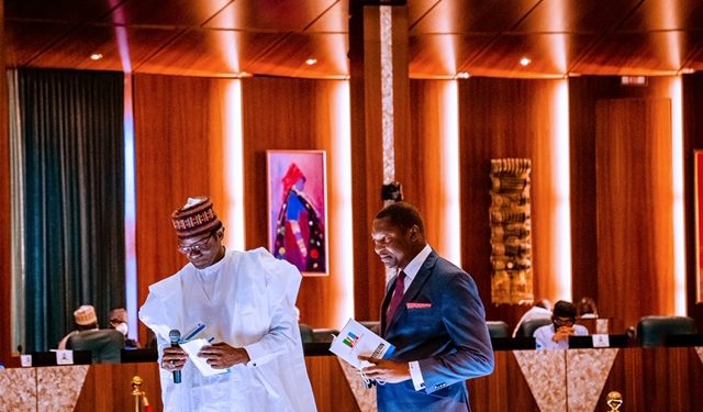 President Buhari and vice President Yemi Osinbajo at APC NEC. Photos: Tolani Alli