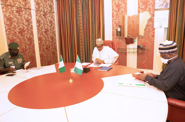 President Buhari receives briefing from Lt-Gen Buratai