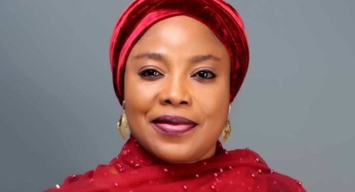 Buhari salutes Minister of State for FCT, Ramatu Tijjani, at 50