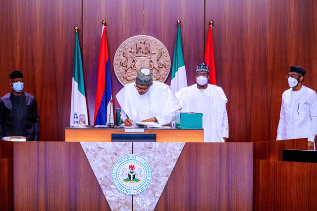 President Buhari signs reviewed 2020 Appropriation Bill, at the State House, on Friday