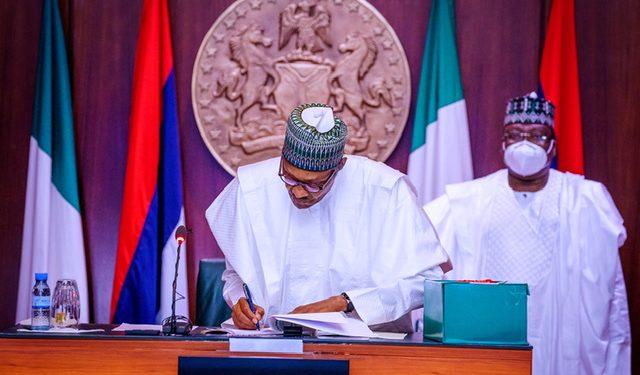President Buhari signs reviewed 2020 Appropriation Bill, at the State House, on Friday
