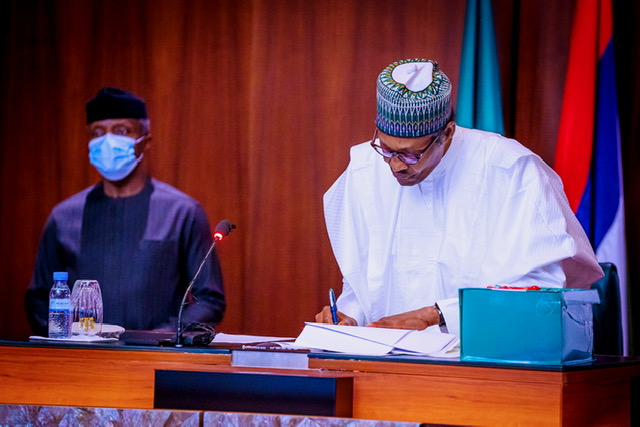 President Buhari signs reviewed 2020 Appropriation Bill, at the State House, on Friday