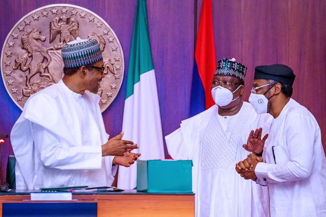 President Buhari signs reviewed 2020 Appropriation Bill, at the State House, on Friday