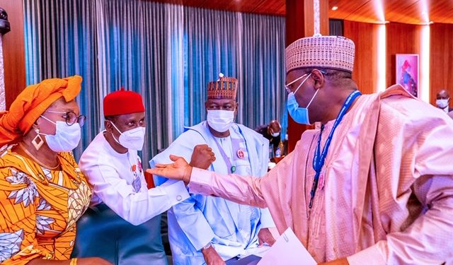 Buhari swears-in INEC chairman, Professor Mahmood Yakubu