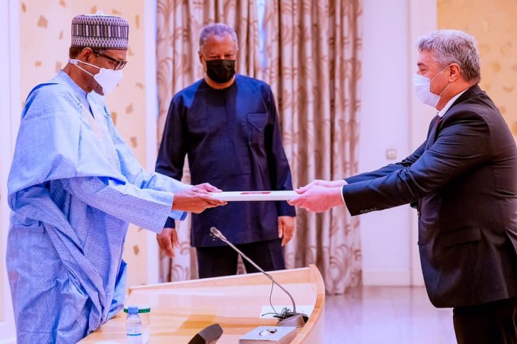 Let’s collectively win war against COVID-19, struggling economies, Buhari tells new envoys