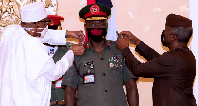 Buhari decorates Chief of Army Staff, Faruk Yahaya, with new rank