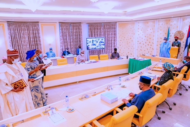 Buhari swears-in 5 new Permanent Secretaries