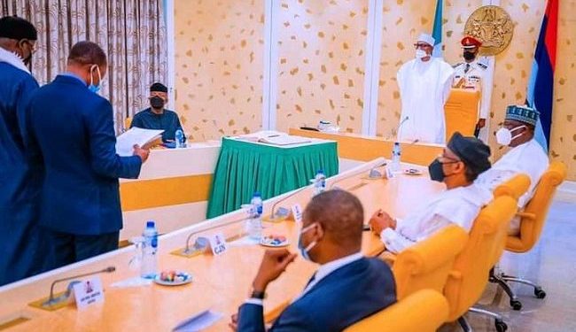 Buhari swears-in 2 INEC commissioners