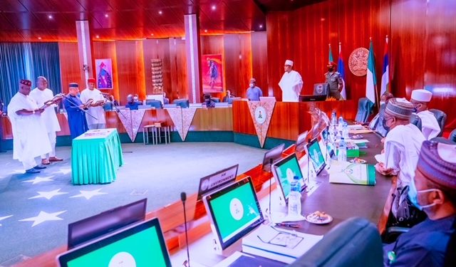 Serve the nation diligently, Buhari charges newly sworn in ministers, redeploys 4 others