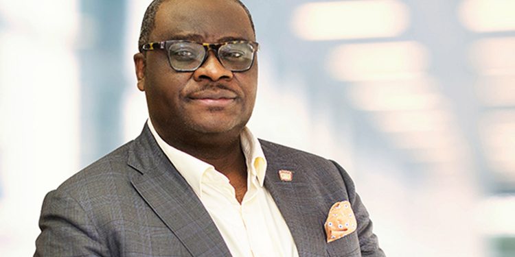 Buhari salutes Sahara Group boss, Kola Adesina, at 58