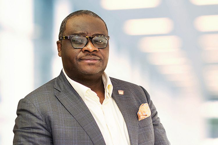 Buhari salutes Sahara Group boss, Kola Adesina, at 58